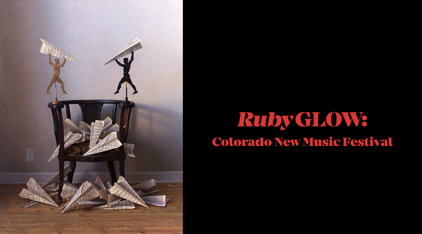 A wooden chair sits on a wooden floor, surrounded by paper airplanes made from sheet music; two small winged figurines stand atop the chair holding airplanes. Text reads "RubyGLOW: Colorado New Music Festival.