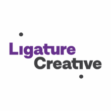 Logo with the words "Ligature Creative"; "Ligature" is in purple, "Creative" is in black, both with stylized "t" letters and two black dots on white background.